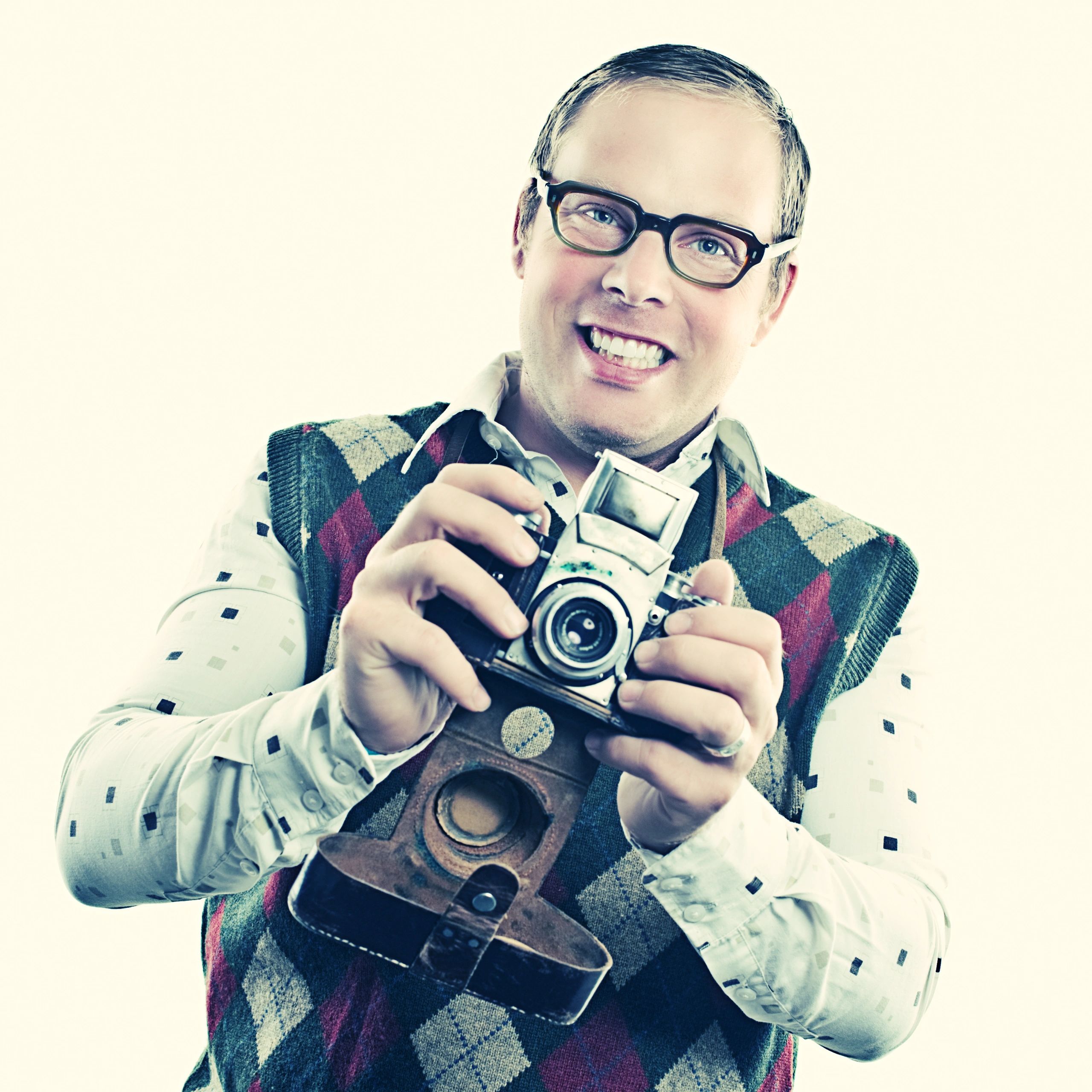 Portrait of a client with a camera