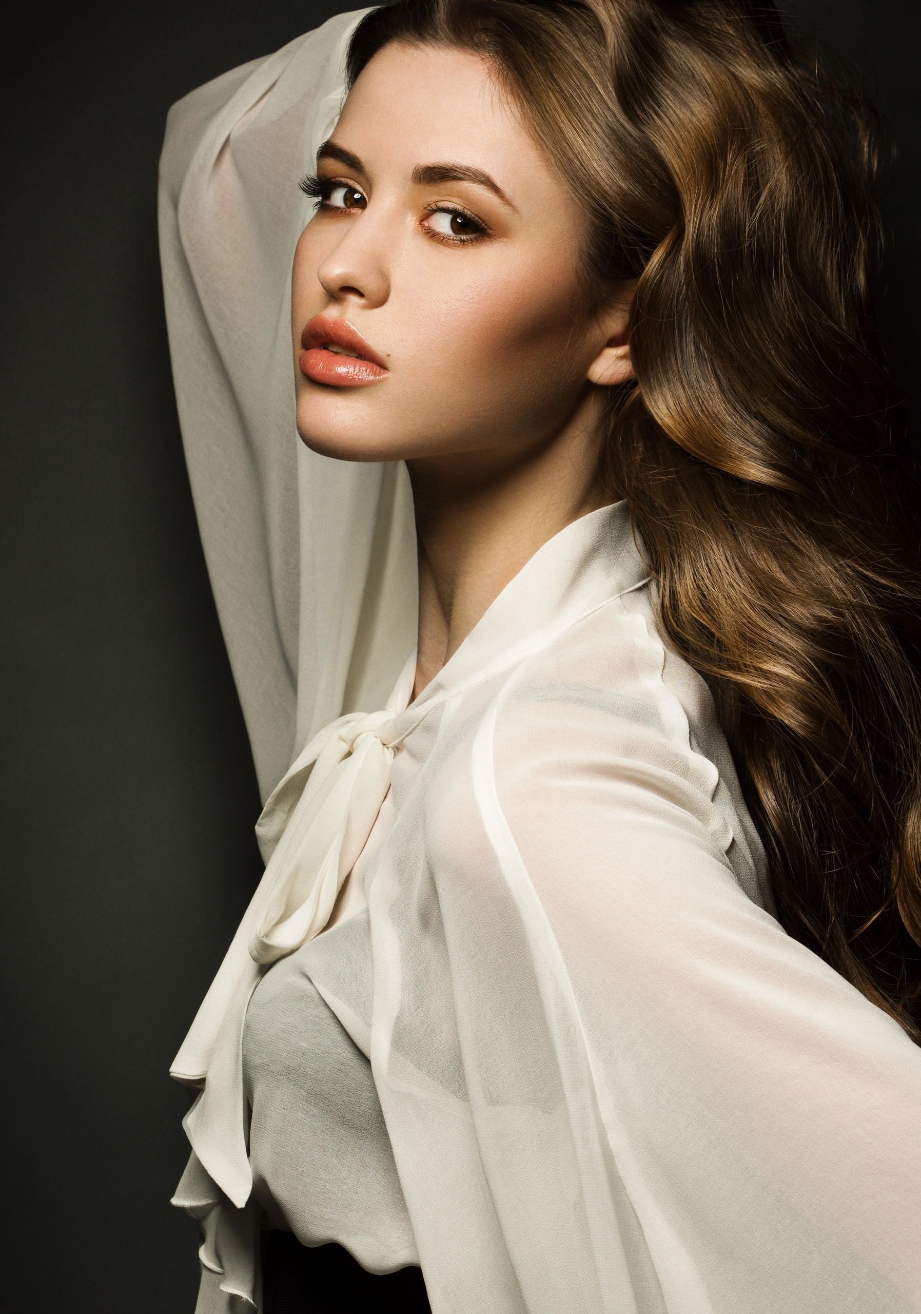 Studio portrait of sensual young woman