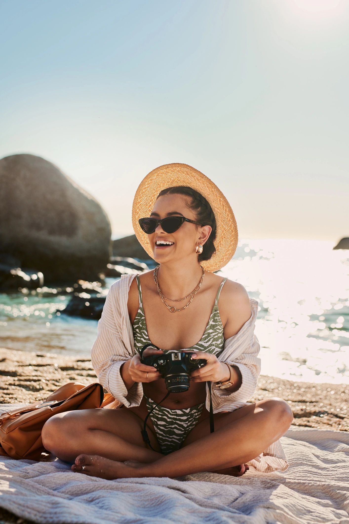 Photographer holding a camera outdoors