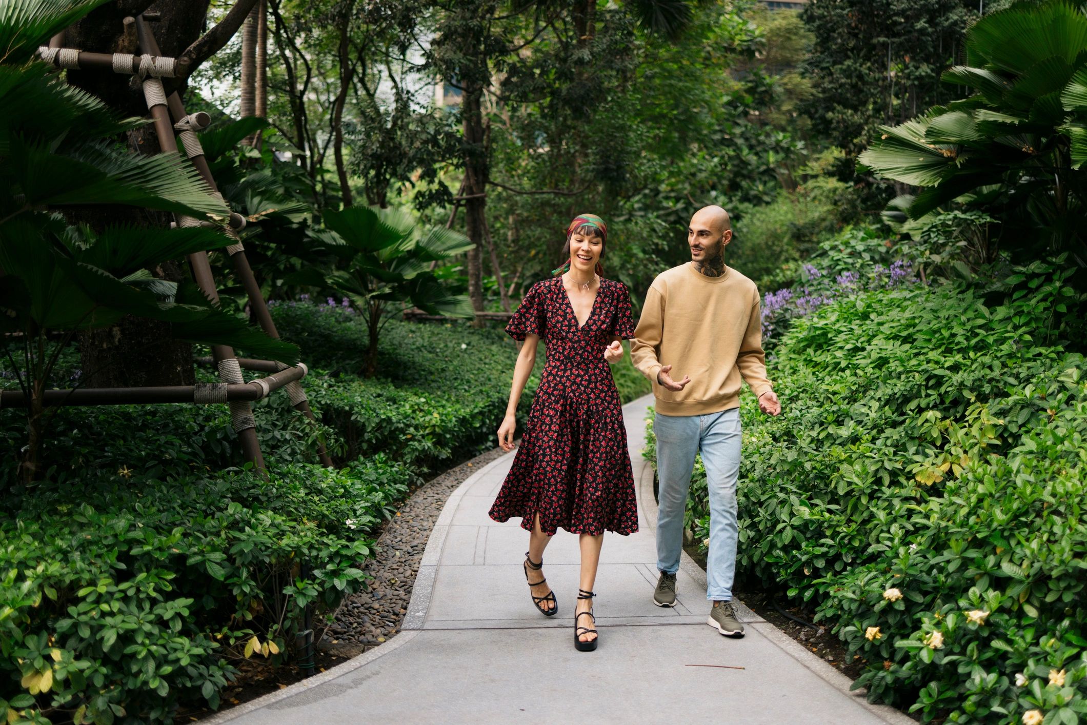 Happy couple walking together in a park