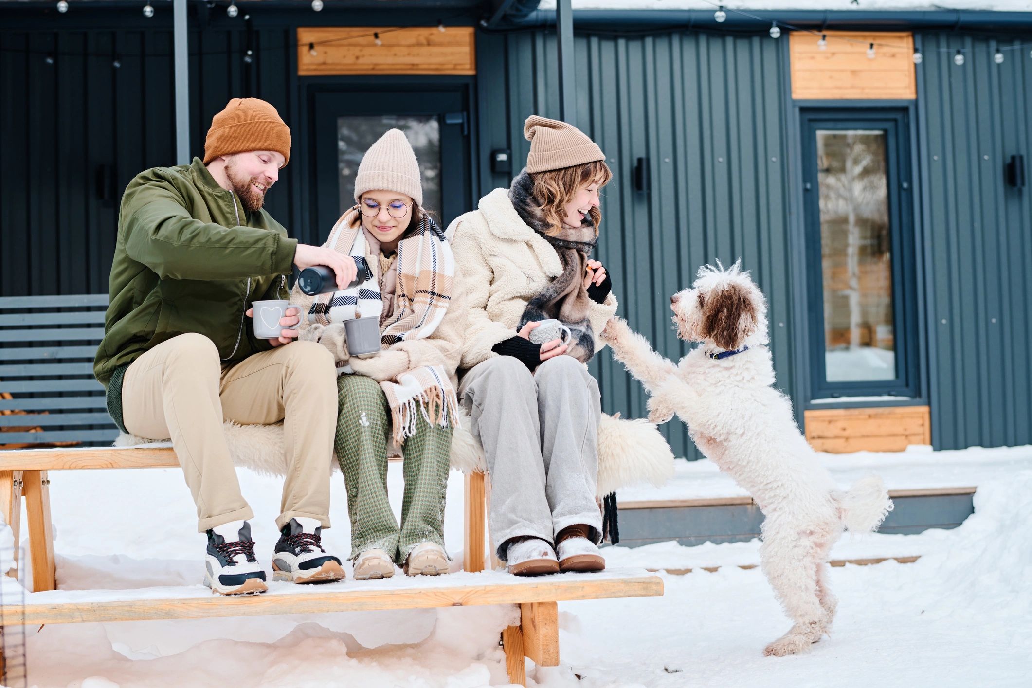 Family with dog enjoying time outdoors