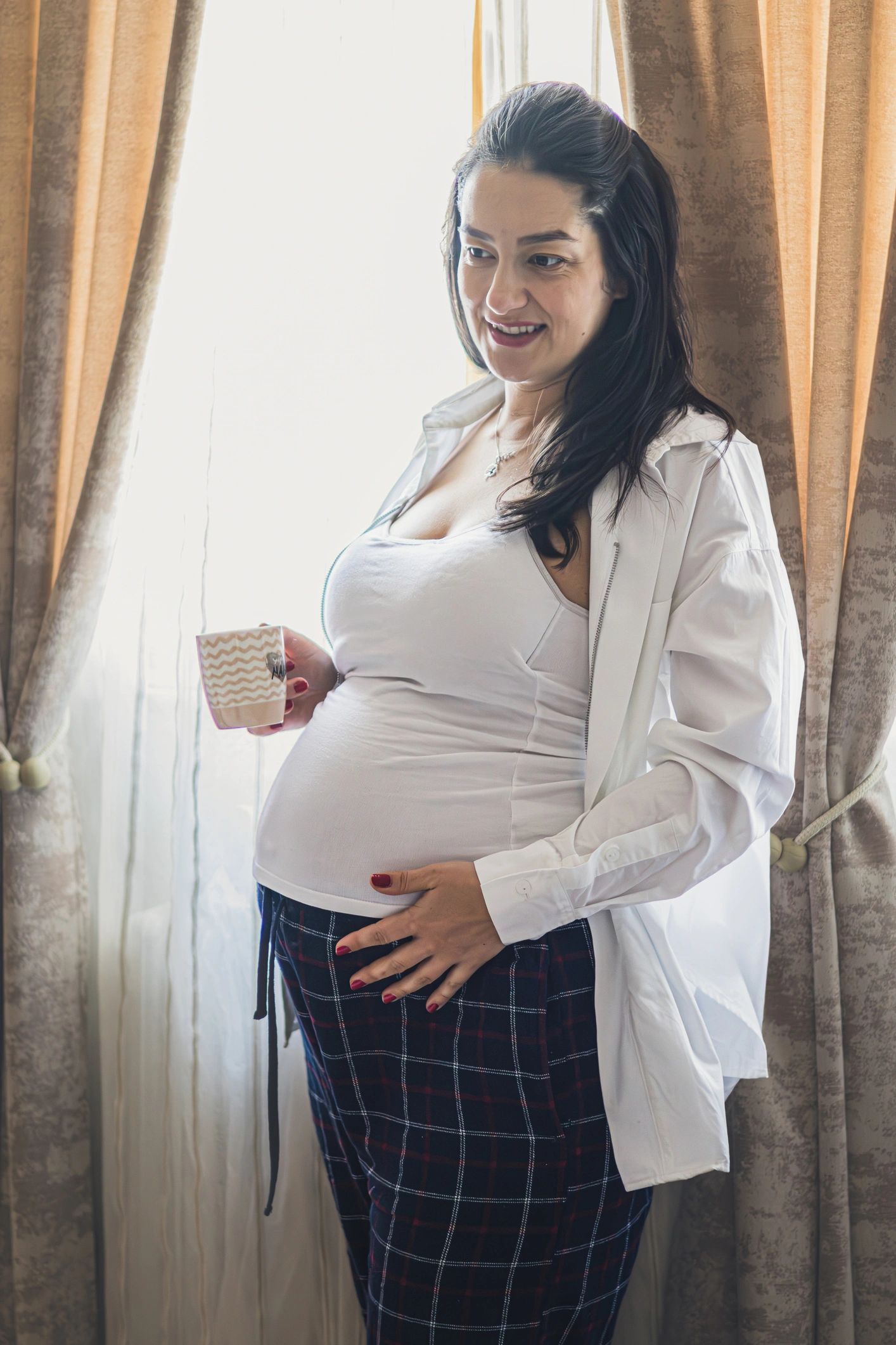 Portrait of a smiling maternity client
