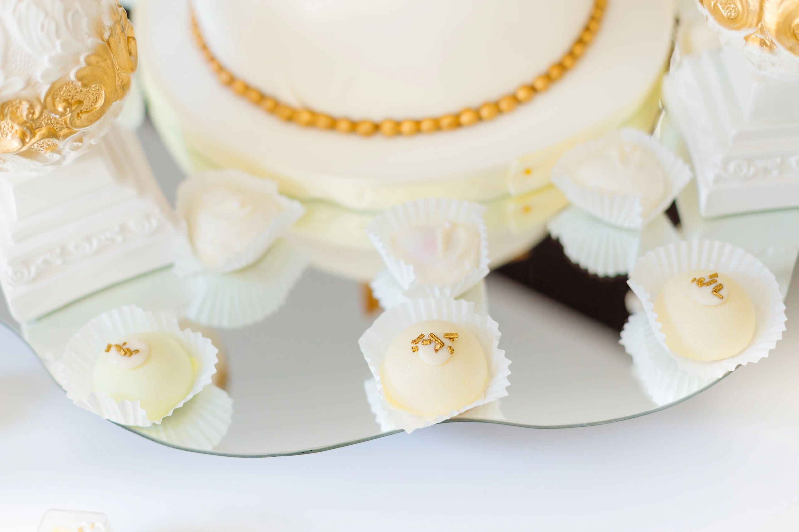 Elegant white and gold celebration cake