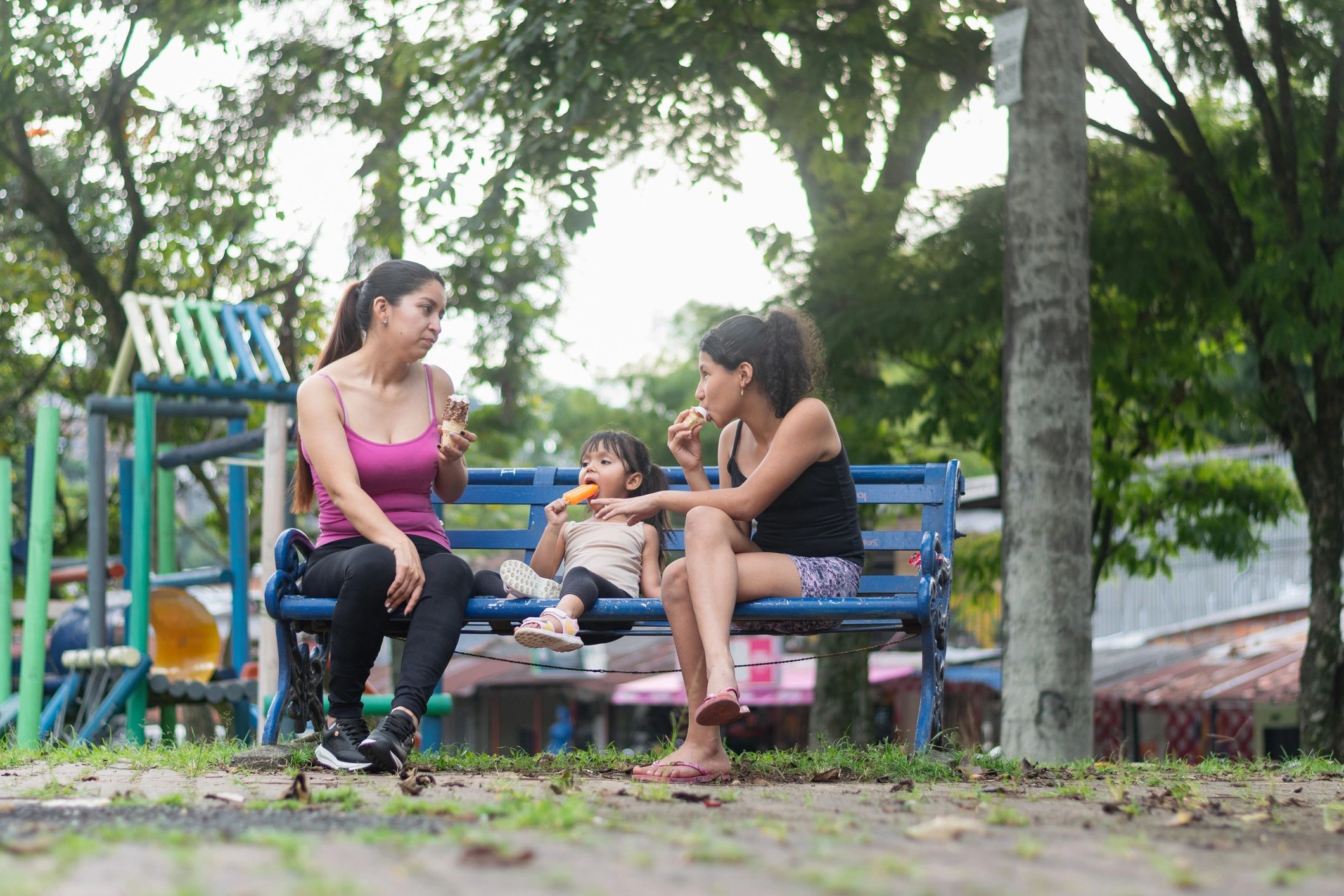 Mother and daughters outdoors