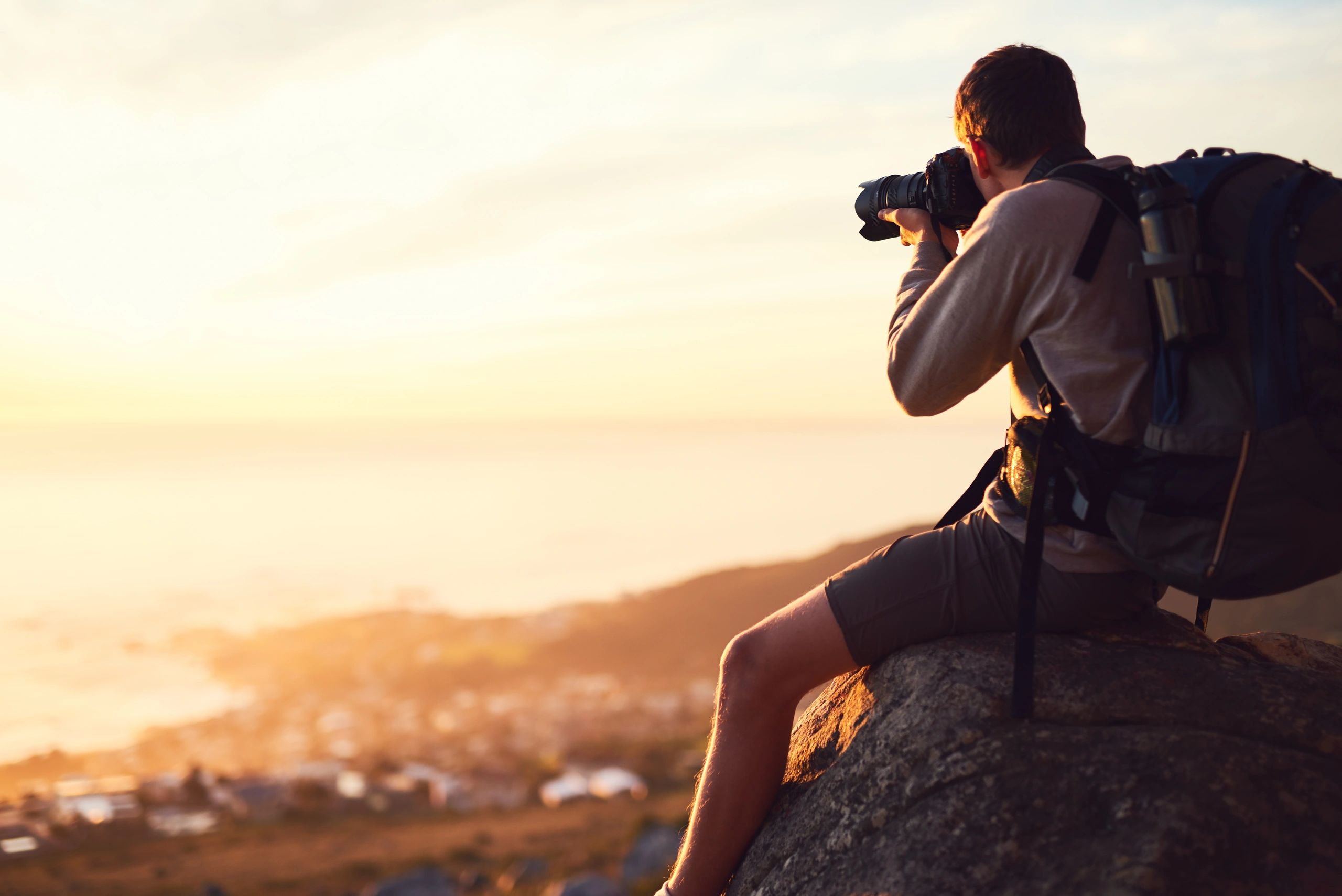 Photographer taking photos in a scenic setting